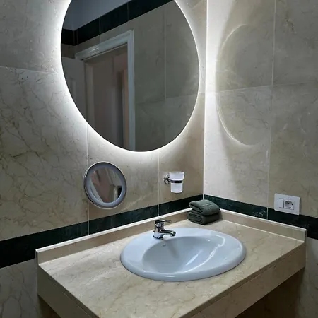Апартаменти Cozy At El Duque